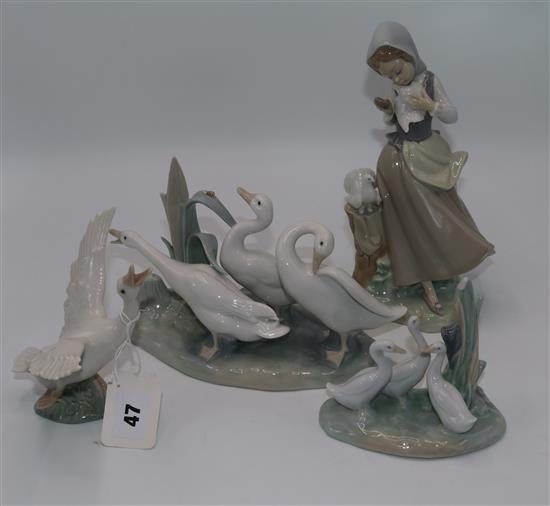 4 Lladro figures - Swans & girl